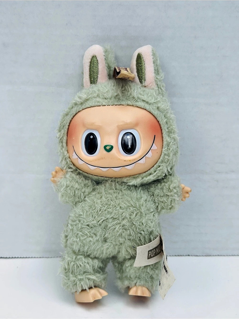 THE MONSTERS Green Plush Toy